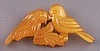 BP12  pearl butterscotch bakelite lovebirds pin